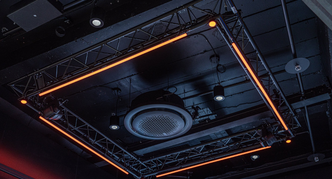 Exposed services, within areas of dropped beams, painted black.